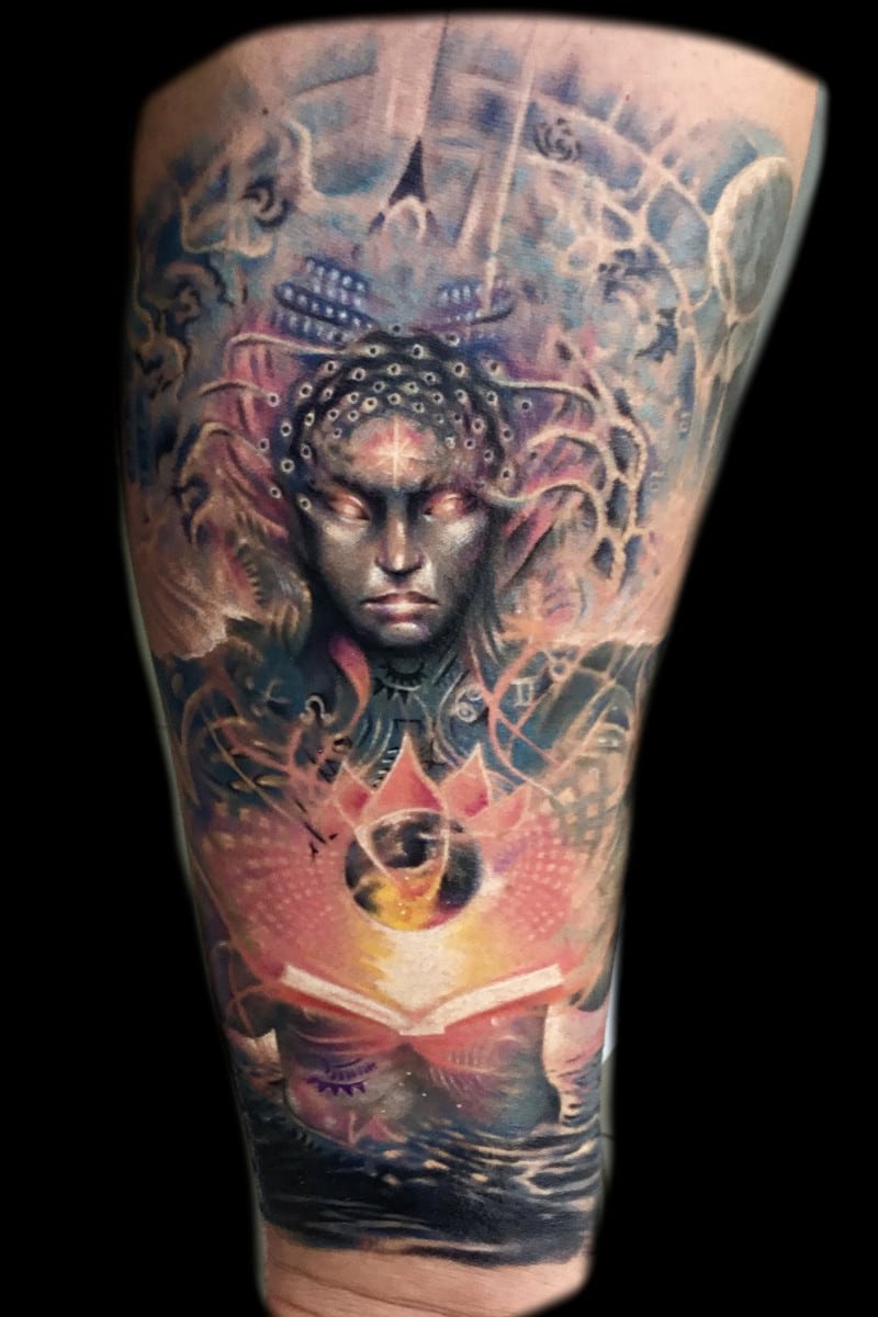 Tatuaje Libro Cósmico